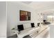 Comfortable sitting area with a white couch and modern decor at 4812 S Windstream Pl, Chandler, AZ 85249