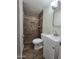 This bathroom showcases a tiled shower and updated vanity at 4924 W Catalina Dr, Phoenix, AZ 85031