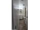 Bathroom featuring wood floors, a white vanity, and a toilet under a recessed light at 4924 W Catalina Dr, Phoenix, AZ 85031