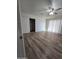 Inviting bedroom with new flooring, natural light, and a closet at 4924 W Catalina Dr, Phoenix, AZ 85031