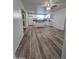Bright kitchen featuring white cabinetry, stainless appliances, and a center island at 4924 W Catalina Dr, Phoenix, AZ 85031