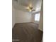 Spacious bedroom with ceiling fan, new carpet, and ample natural light at 5201 N 61St Dr, Glendale, AZ 85301