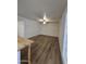 Open living room area with new floors and bright light fixtures at 5201 N 61St Dr, Glendale, AZ 85301