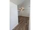 Spacious living room boasts new hardwood flooring, neutral paint, ceiling fan, and plenty of natural light at 5201 N 61St Dr, Glendale, AZ 85301