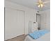 Bedroom featuring a closet and natural light from the two windows at 639 N 57Th Pl, Mesa, AZ 85205