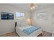 Bedroom featuring natural light from two windows and a full-sized bed at 639 N 57Th Pl, Mesa, AZ 85205