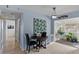 Cozy dining area near the kitchen with charming décor and plenty of natural light at 639 N 57Th Pl, Mesa, AZ 85205