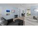 Spacious living area boasting hardwood floors, a ceiling fan, and stylish décor at 639 N 57Th Pl, Mesa, AZ 85205