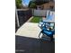 Outdoor patio area with pavers, artificial grass and furniture at 639 N 57Th Pl, Mesa, AZ 85205
