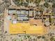 Aerial view of a new construction home featuring wood framing and partial roof under beautiful desert landscape at 7646 E Hidden Canyon St, Mesa, AZ 85207