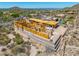 Home under construction with wood framing, featuring desert landscaping and scenic mountain views at 7646 E Hidden Canyon St, Mesa, AZ 85207
