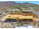 Home under construction with wood framing, featuring desert landscaping and scenic mountain views at 7646 E Hidden Canyon St, Mesa, AZ 85207
