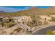 Home under construction in desert landscape with mountain views at 7646 E Hidden Canyon St, Mesa, AZ 85207