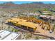 Construction of a desert home with mountain views being framed, showing the initial stages of development at 7646 E Hidden Canyon St, Mesa, AZ 85207