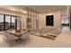 Elegant dining room with contemporary lighting, wine storage, and a view of the staircase at 7646 E Hidden Canyon St, Mesa, AZ 85207