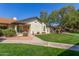 A picturesque home is complemented by a beautifully maintained lawn and carefully chosen desert landscaping at 8140 N 107Th Ave # 120, Peoria, AZ 85345