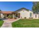 Charming home featuring a well-maintained lawn, lovely desert landscaping, and a welcoming front porch at 8140 N 107Th Ave # 120, Peoria, AZ 85345