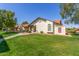 This well-kept home boasts a lush lawn and desert-friendly landscaping, enhancing its curb appeal at 8140 N 107Th Ave # 120, Peoria, AZ 85345