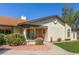 This charming home is adorned with a lush lawn, drought-tolerant landscaping, and a cozy front porch at 8140 N 107Th Ave # 120, Peoria, AZ 85345