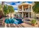Amazing backyard featuring a refreshing pool, hot tub, covered patio, and beautiful landscaping, great for entertaining at 8424 E San Bernardo Dr, Scottsdale, AZ 85258