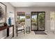 Second story lounge with comfortable seating and multiple windows overlooking the yard at 8424 E San Bernardo Dr, Scottsdale, AZ 85258
