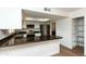 Well-lit kitchen featuring granite countertops, stainless steel appliances, and white cabinets with ample storage at 8621 E Vista Dr, Scottsdale, AZ 85250