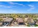 Beautiful aerial view showing a house, a two car garage, desert landscaping, and mountain views at 903 W Raven Dr, Chandler, AZ 85286