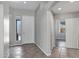 Inviting entryway with tile flooring and white doors, offering a clean and modern aesthetic at 903 W Raven Dr, Chandler, AZ 85286