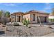 Charming home featuring desert landscaping, a two-car garage, and a welcoming entrance at 903 W Raven Dr, Chandler, AZ 85286