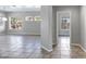Open living space with neutral walls and tiled floor at 903 W Raven Dr, Chandler, AZ 85286