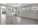 Spacious open-concept living area featuring tile floors and neutral walls at 903 W Raven Dr, Chandler, AZ 85286
