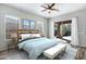 Tranquil main bedroom with a plush bed, and sliding glass doors leading to the backyard at 903 W Raven Dr, Chandler, AZ 85286
