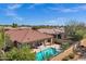 Private backyard pool with spa, covered patio, and mature landscaping at 903 W Raven Dr, Chandler, AZ 85286