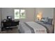 Bright bedroom with a desk and a window view, providing a comfortable workspace and relaxing view at 10444 N 69Th St # 128, Paradise Valley, AZ 85253