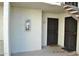 The front entrance has security doors and a welcome mat at 10444 N 69Th St # 128, Paradise Valley, AZ 85253