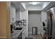 Bright kitchen features stainless steel appliances, granite countertops and ample cabinet space at 10444 N 69Th St # 128, Paradise Valley, AZ 85253