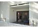 Cozy outdoor patio with sliding glass doors leading to the living area at 10444 N 69Th St # 128, Paradise Valley, AZ 85253