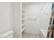 Bright, neutral bathroom showcasing white tub/shower combination and tiled floors at 10961 W Taylor St, Avondale, AZ 85323