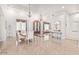 This home includes an elegant dining room that is open to the foyer and living room at 11054 E North Ln, Scottsdale, AZ 85259
