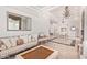 Bright living room with high ceilings, chandelier, and an open layout at 11054 E North Ln, Scottsdale, AZ 85259