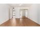 Neutral bedroom with tan tiled flooring, ceiling fan and mirrored closet doors at 1159 W Emelita Ave, Mesa, AZ 85210