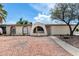 Charming one-story home featuring unique architectural details and desert-friendly landscaping at 1159 W Emelita Ave, Mesa, AZ 85210