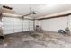 Spacious 2-car garage with an automatic door opener and concrete flooring at 1159 W Emelita Ave, Mesa, AZ 85210