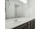 Well-lit bathroom with a large mirror, modern sink, and vanity, creating a serene and functional space at 11910 E Amanda Rd, Gold Canyon, AZ 85118
