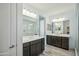 Spacious bathroom features double vanity, a glass enclosed walk-in shower, and sleek design at 11910 E Amanda Rd, Gold Canyon, AZ 85118