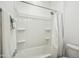 Clean bathroom featuring a shower-tub combo with a shower curtain and fresh towels for convenience at 11910 E Amanda Rd, Gold Canyon, AZ 85118