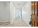 Inviting entryway with light gray walls and stylish wood-look tile flooring at 11910 E Amanda Rd, Gold Canyon, AZ 85118