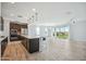Open concept kitchen featuring stainless appliances and views of the outdoor living space at 11910 E Amanda Rd, Gold Canyon, AZ 85118