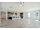 Open-concept kitchen and living area with ample seating and modern pendant lighting at 11910 E Amanda Rd, Gold Canyon, AZ 85118