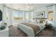 Tastefully decorated bedroom featuring a large bed, stylish furniture, and an airy ambiance at 11910 E Amanda Rd, Gold Canyon, AZ 85118